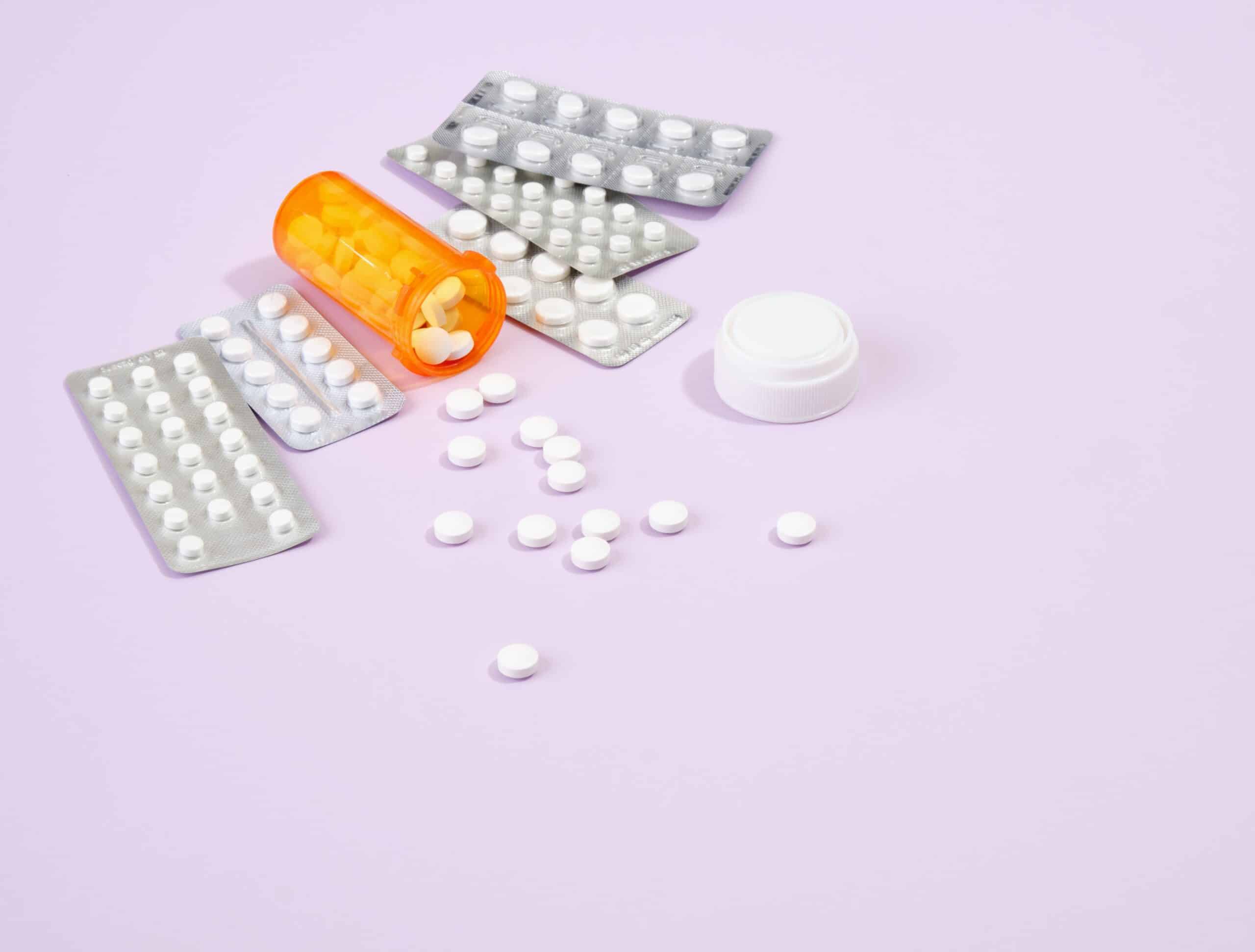 Capsules,And,Tablets,In,Blister,Packs,On,Table.,White,Pills